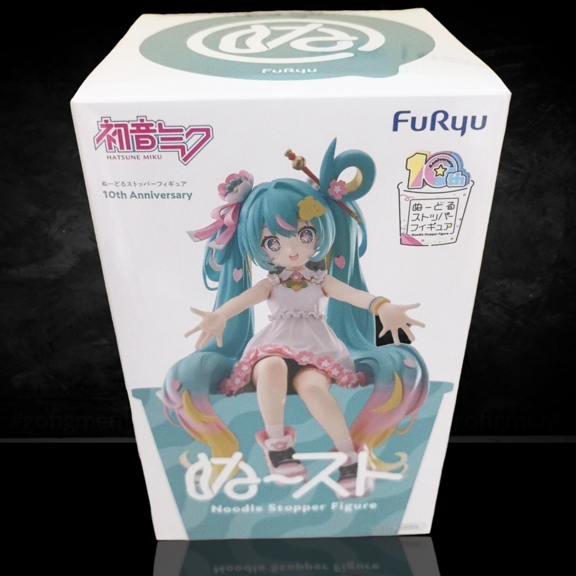 Hatsune Miku 10th Anniversary Noodle Stopper Statue FuRyu by Banpresto, detailed figure in white and pink outfit with turquoise hair