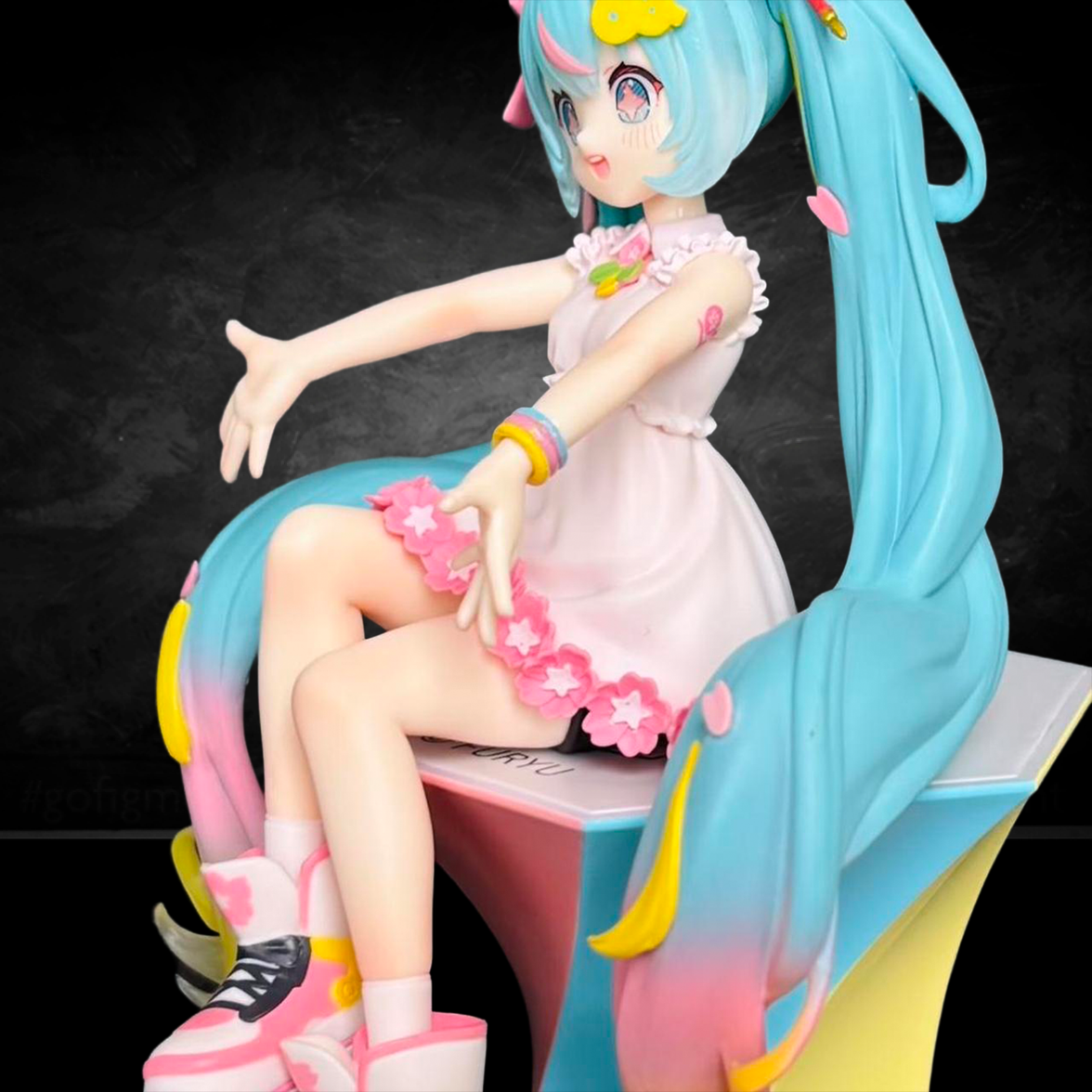Hatsune Miku 10th Anniversary Noodle Stopper Statue FuRyu by Banpresto in pastel pink dress with floral trim and blue twin tails
