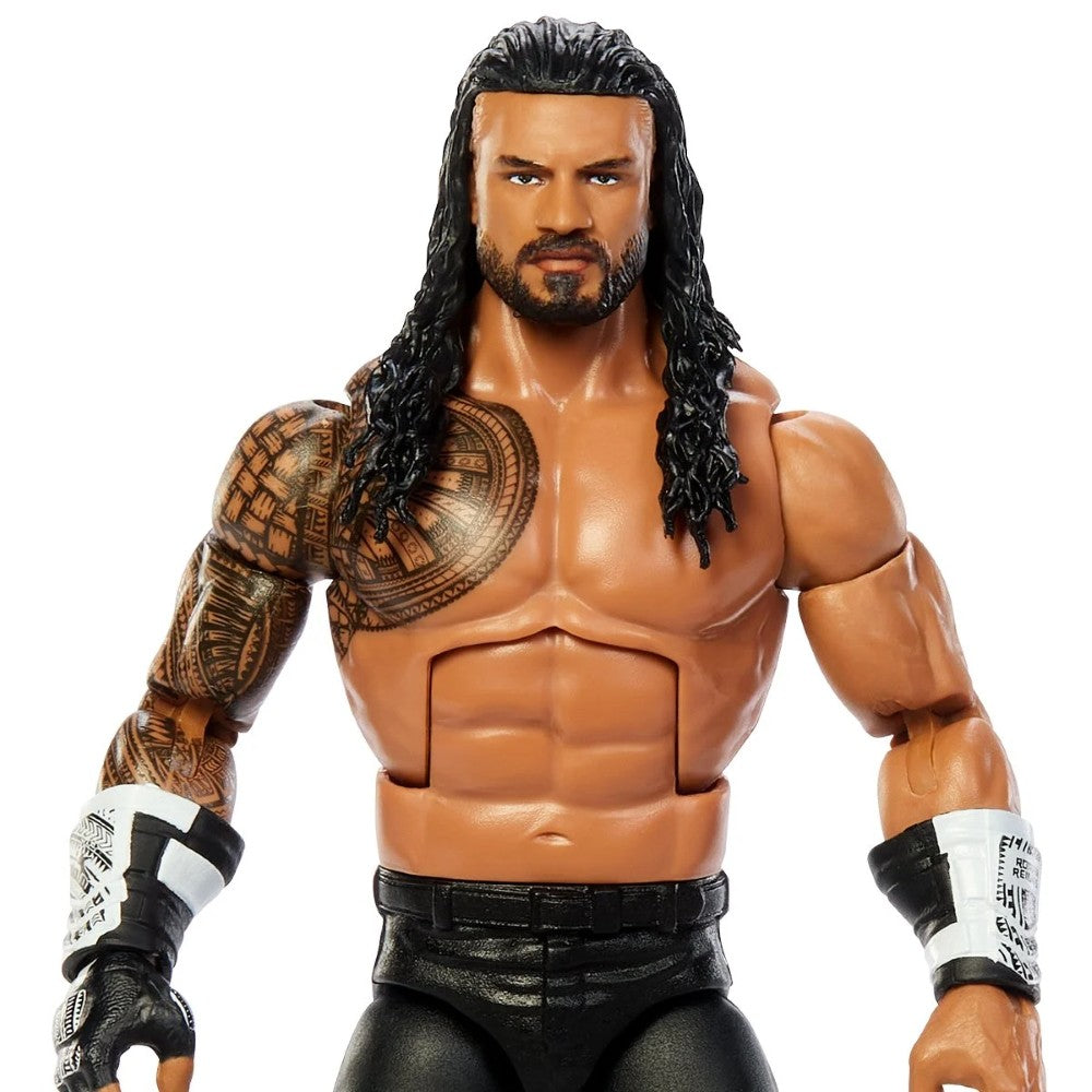 Wrestling action figure with long black hair, beard, tattoos, black trunks, and white wrist tape