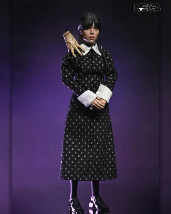 Wednesday Addams Classic Dress 8-Inch Clothed Action Figure NECA in black patterned dress with braided hair and hand accessory new in box collectible