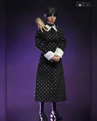 Wednesday Addams Classic Dress 8-Inch Clothed Action Figure NECA in black patterned dress with braided hair and hand accessory new in box collectible