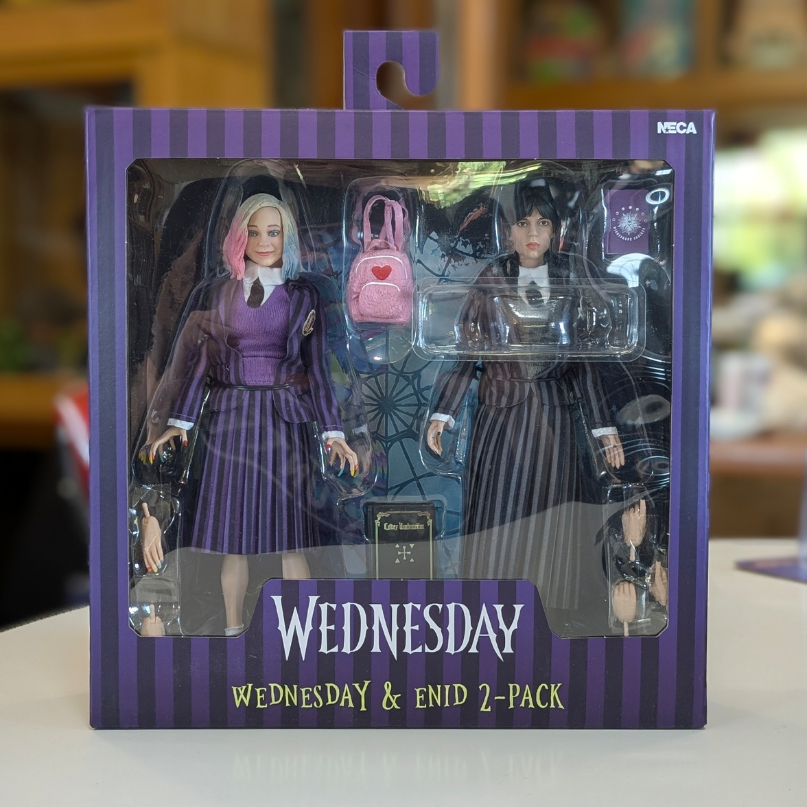 Wednesday and Enid 8-Inch Clothed Action Figure 2-Pack new in box collectible by NECA from The Addams Family