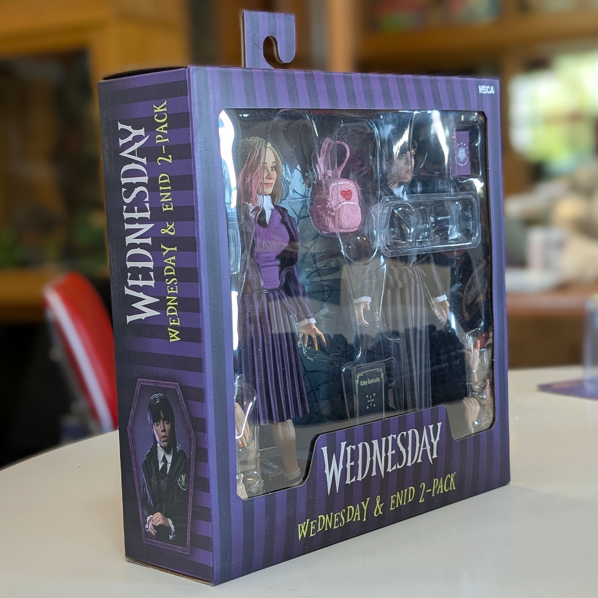 Wednesday and Enid 8-Inch Clothed Action Figure 2-Pack by NECA, new in box collectible from The Addams Family
