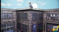 Person sitting on a rooftop with a blue sky background
