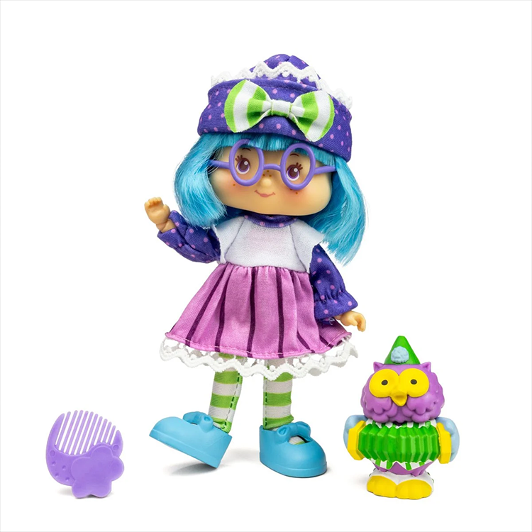 Strawberry Shortcake Plum Pudding doll with blue hair, purple dress, glasses, comb, and colorful owl accessory by Loyal Subjects
