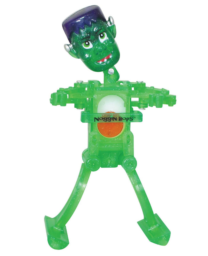 California Creations - Noggin Bop Monster, Frank translucent green plastic toy with purple hair and animated face