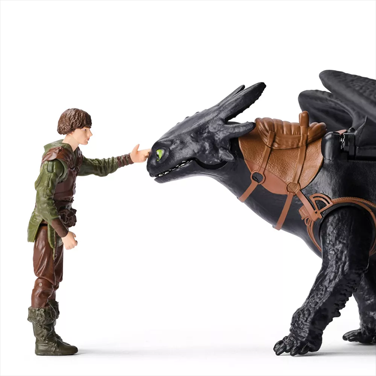 Spin Master How to Train Your Dragon Hiccup and Toothless action figures facing each other on white background