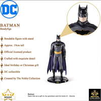 The Noble Collection bendable Batman figure with stand approx 19cm tall in black and grey costume close-up face detail