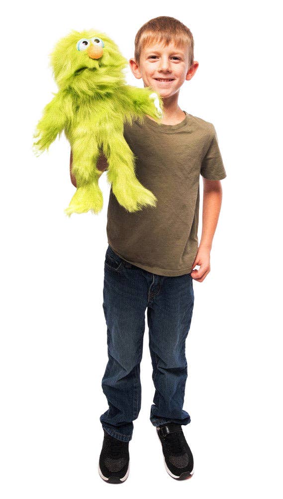 Silly Puppets - Silly Puppets Monster, Green (14") plush with fuzzy fur and movable limbs held by smiling boy aged 6-10