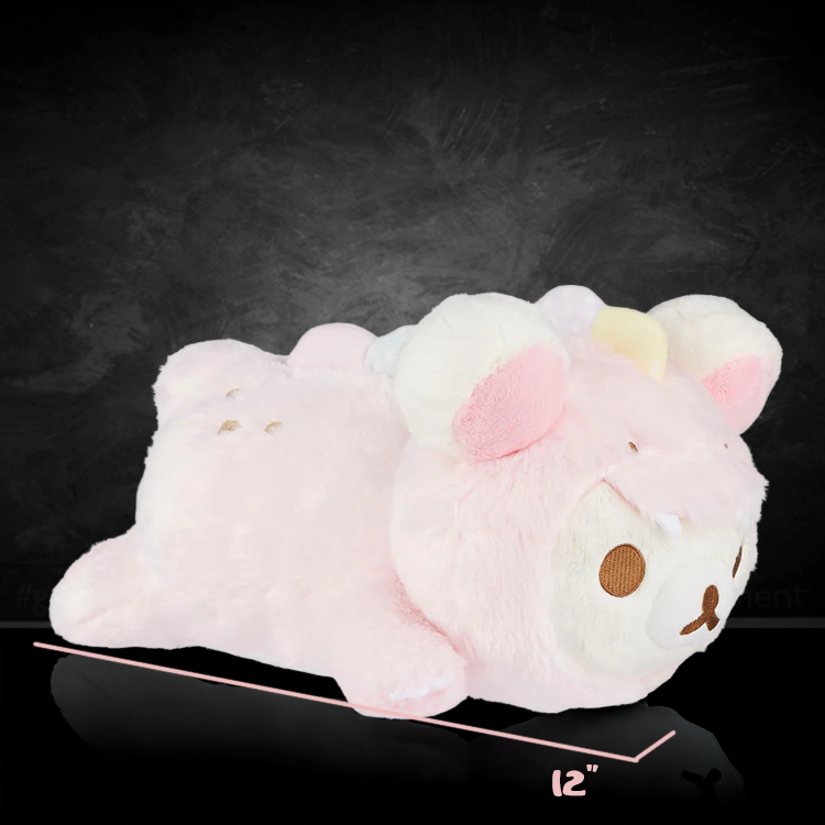 Korilakkuma plush in pink dinosaur laydown costume measuring 12 inches from San-X on black background