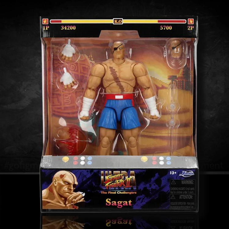 Ultra Street Fighter II Sagat 6-inch deluxe action figure by Jada Toys in packaging with extra hands and boxing glove accessories