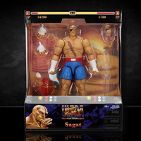 Ultra Street Fighter II Sagat 6-inch deluxe action figure by Jada Toys in packaging with extra hands and boxing glove accessories