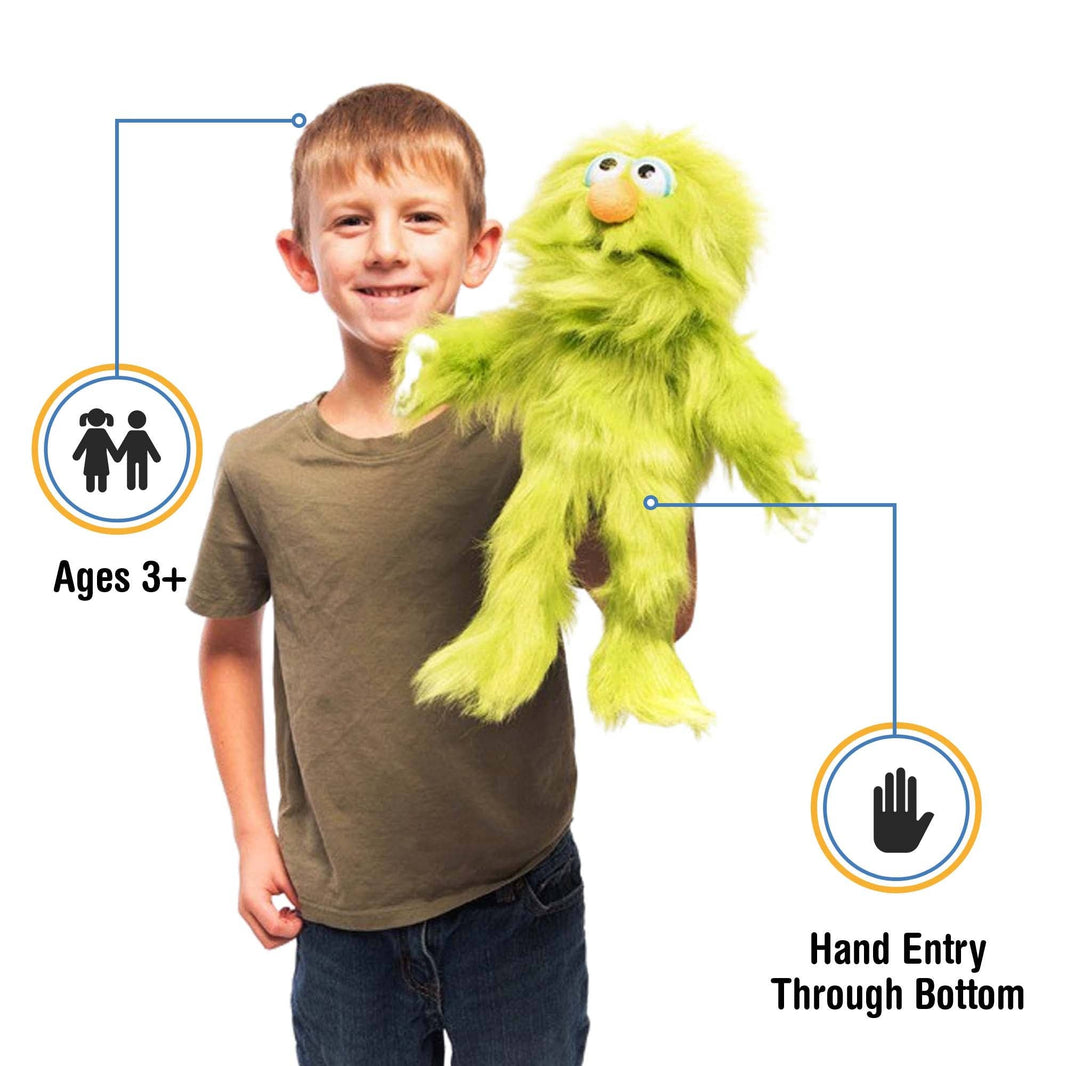 Silly Puppets - Silly Puppets Monster, Green (14") plush with fuzzy fur and movable limbs held by smiling child aged 3+