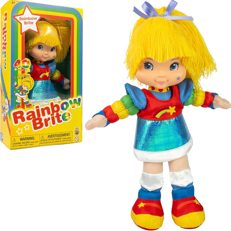 Rainbow Brite 12-inch plush doll with yellow hair in colorful outfit displayed next to The Loyal Subjects packaging box