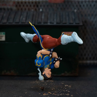 Jada Toys Ultra Street Fighter II Chun-Li 6-inch action figure performing a dynamic upside-down kick pose outdoors