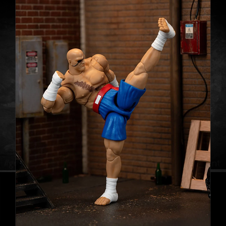 Jada Toys Ultra Street Fighter II Sagat deluxe action figure in blue shorts performing high kick pose