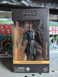Hasbro Darth Maul action figure from Star Wars Black Series with double-bladed lightsaber in premium packaging