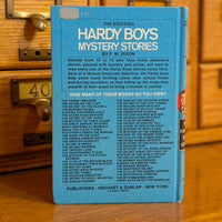 Vintage Hardy Boys book 26 The Phantom Freighter with blue back published by Grosset & Dunlap Inc.