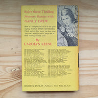Back cover of "19 The Quest of the Missing Map Nancy Drew Mystery Books 1942/1969" by Grosset & Dunlp, Inc. with story list.