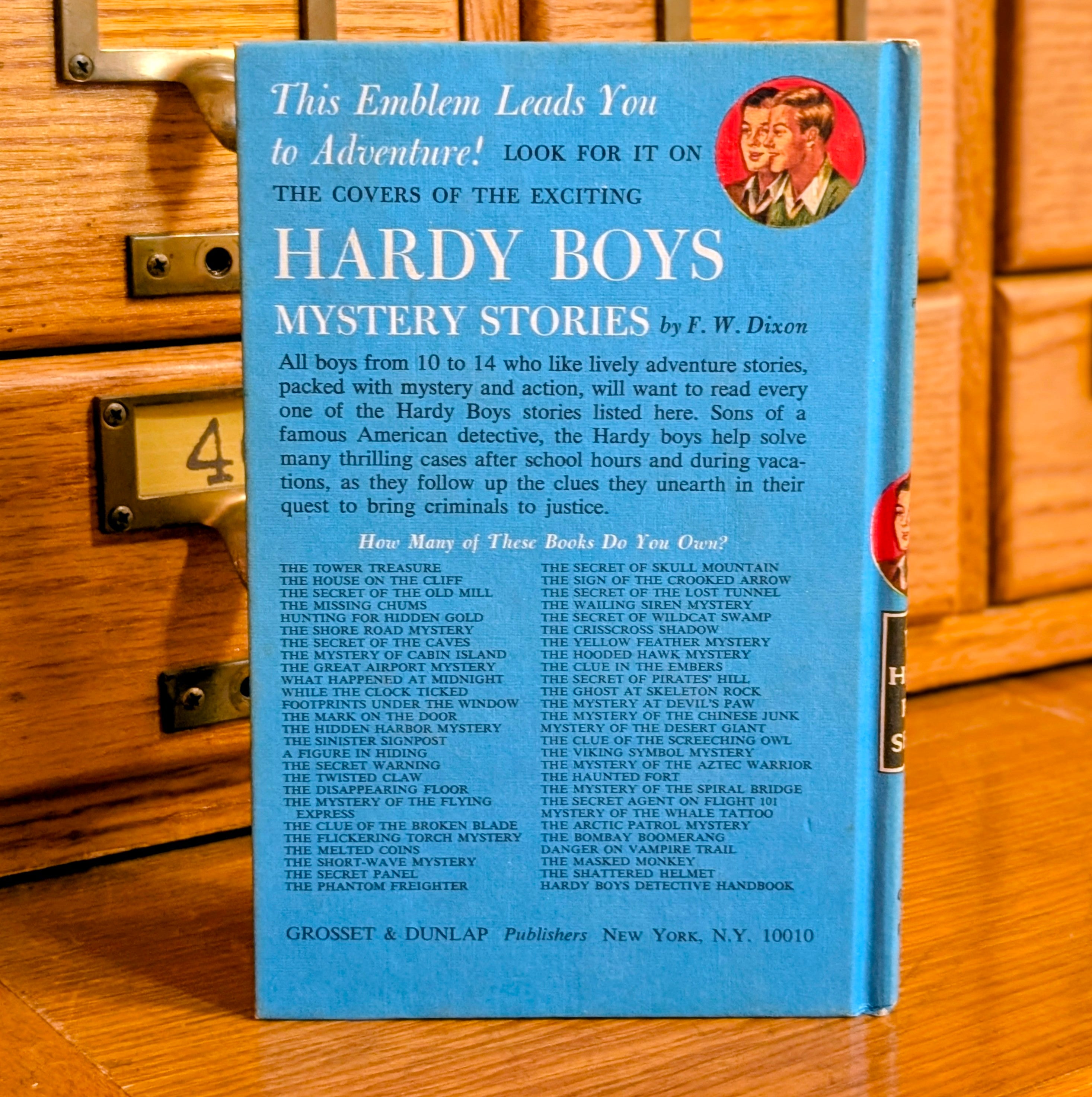Vintage 1970 Hardy Boys book 23 The Melted Coins published by Grosset & Dunlap Inc with blue back cover