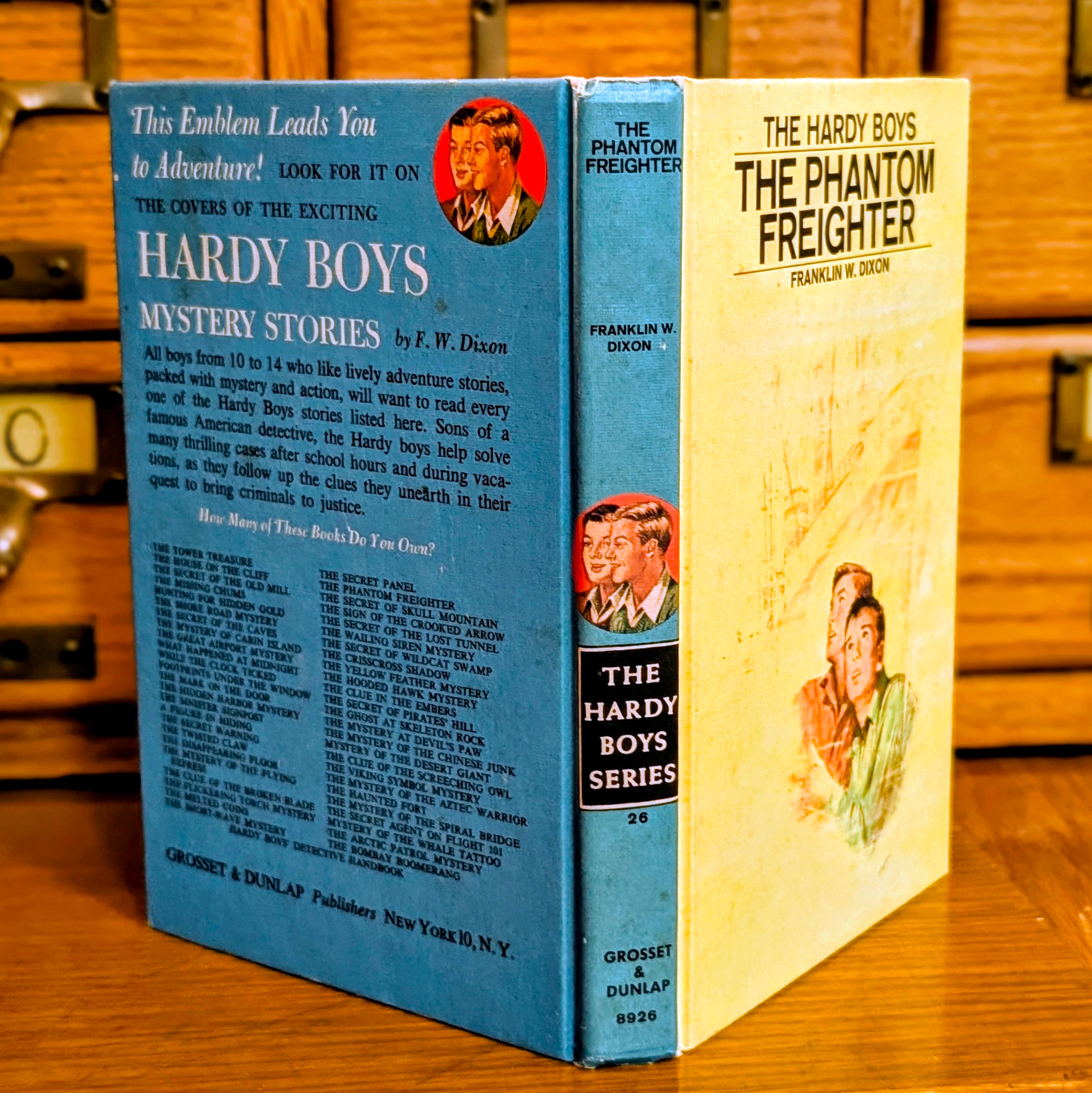 Vintage Hardy Boys book The Phantom Freighter 26 by Grosset & Dunlap Inc with classic blue back cover design