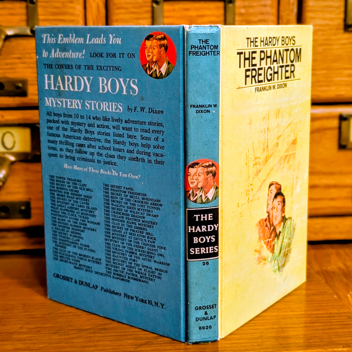 Vintage Hardy Boys book The Phantom Freighter 26 by Grosset & Dunlap Inc with classic blue back cover design