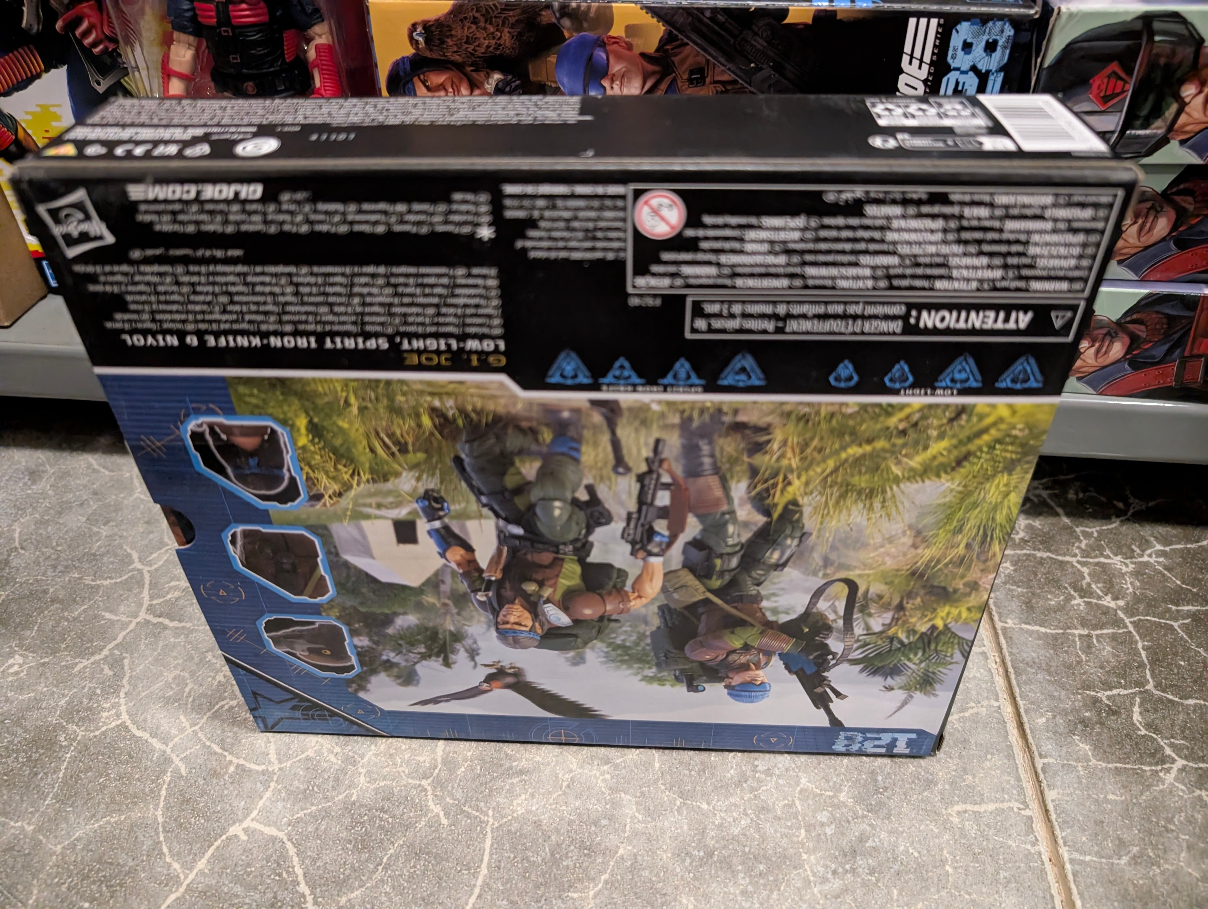 Hasbro G.I. Joe Classified Series Low-Light Spirit Iron-Knife action figures packaging back view with jungle background artwork