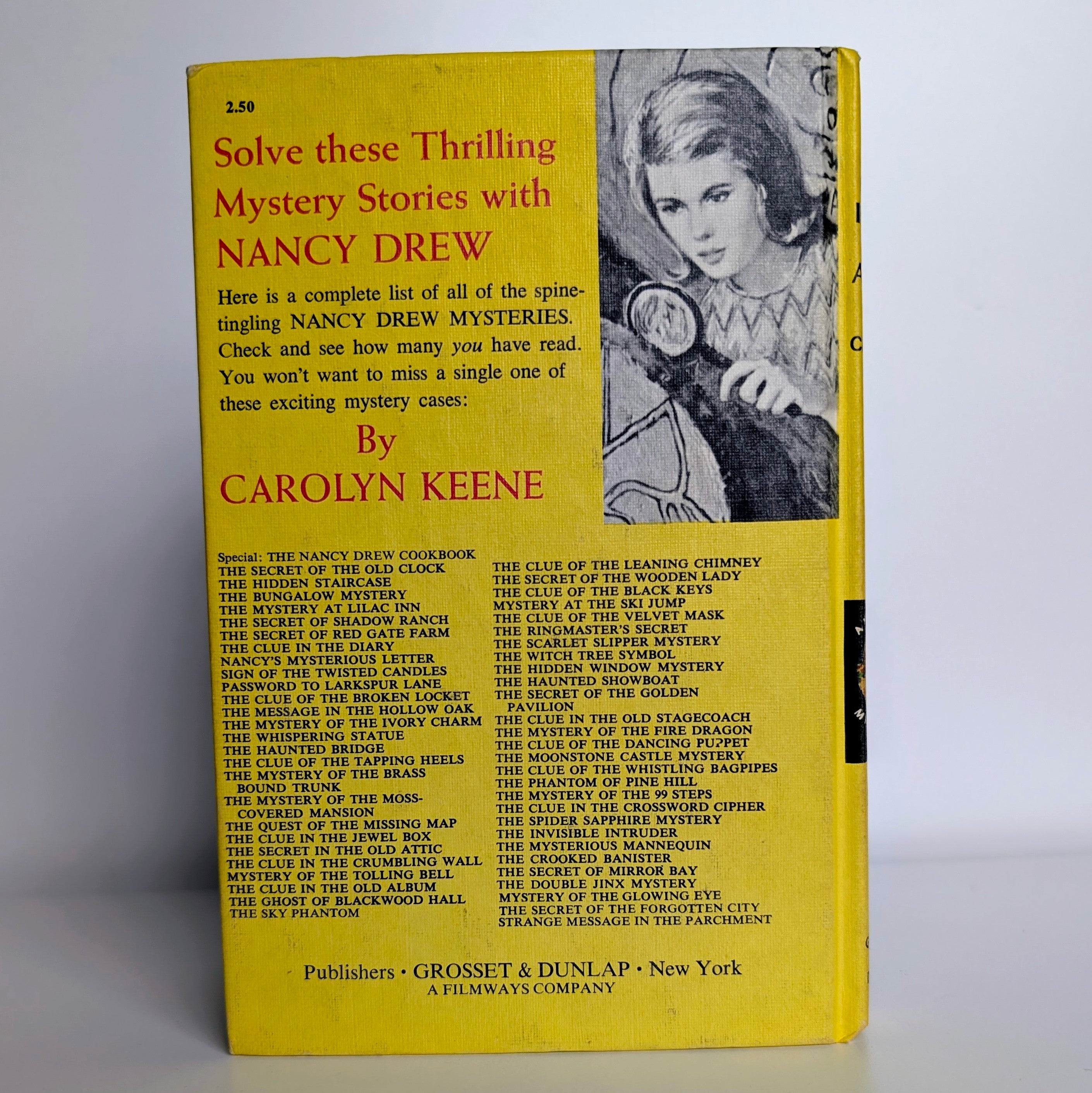 Vintage Nancy Drew Mystery The Clue in the Old Album 1947 yellow bar edition by Grosset & Dunlap