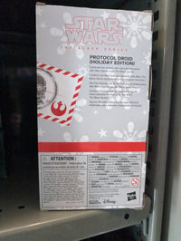 Star Wars Black Series Holiday Edition Protocol Droid figure box by Hasbro with festive snowflake design
