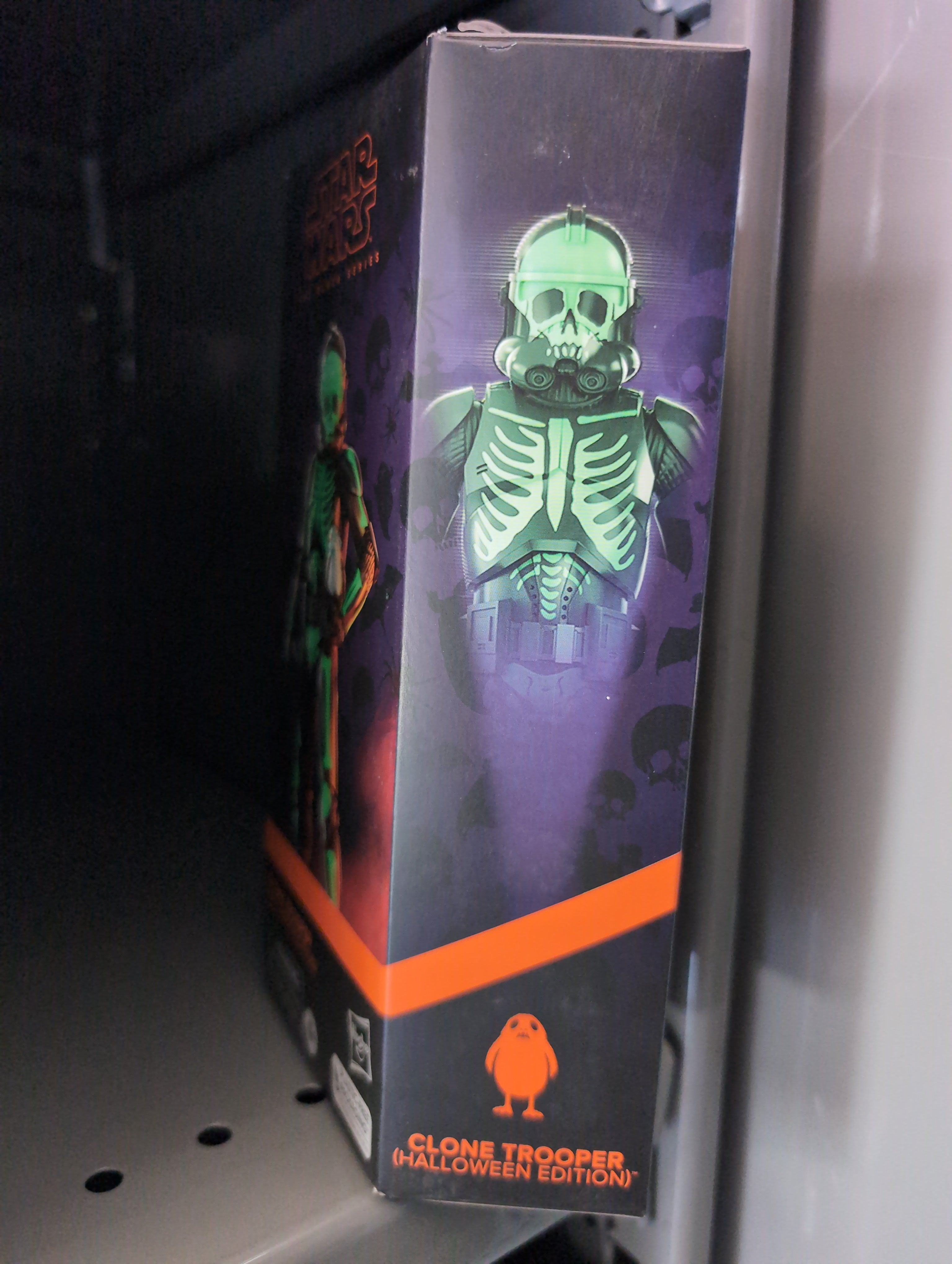Hasbro Star Wars Halloween Clone Trooper Black Series box featuring skeleton armor design on a shelf