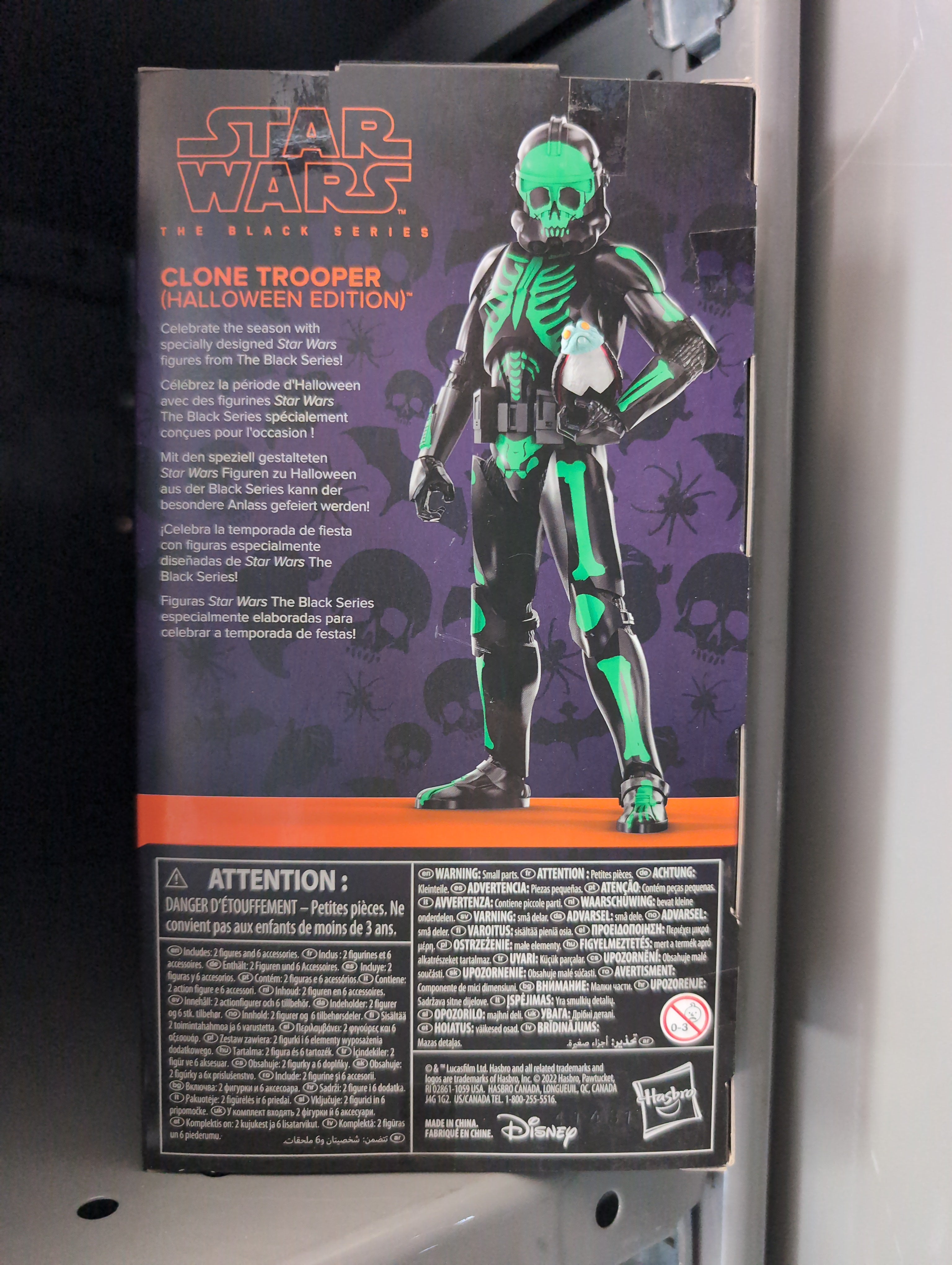 Hasbro Star Wars Black Series Clone Trooper Halloween Edition figure with green skeletal armor design in collector box