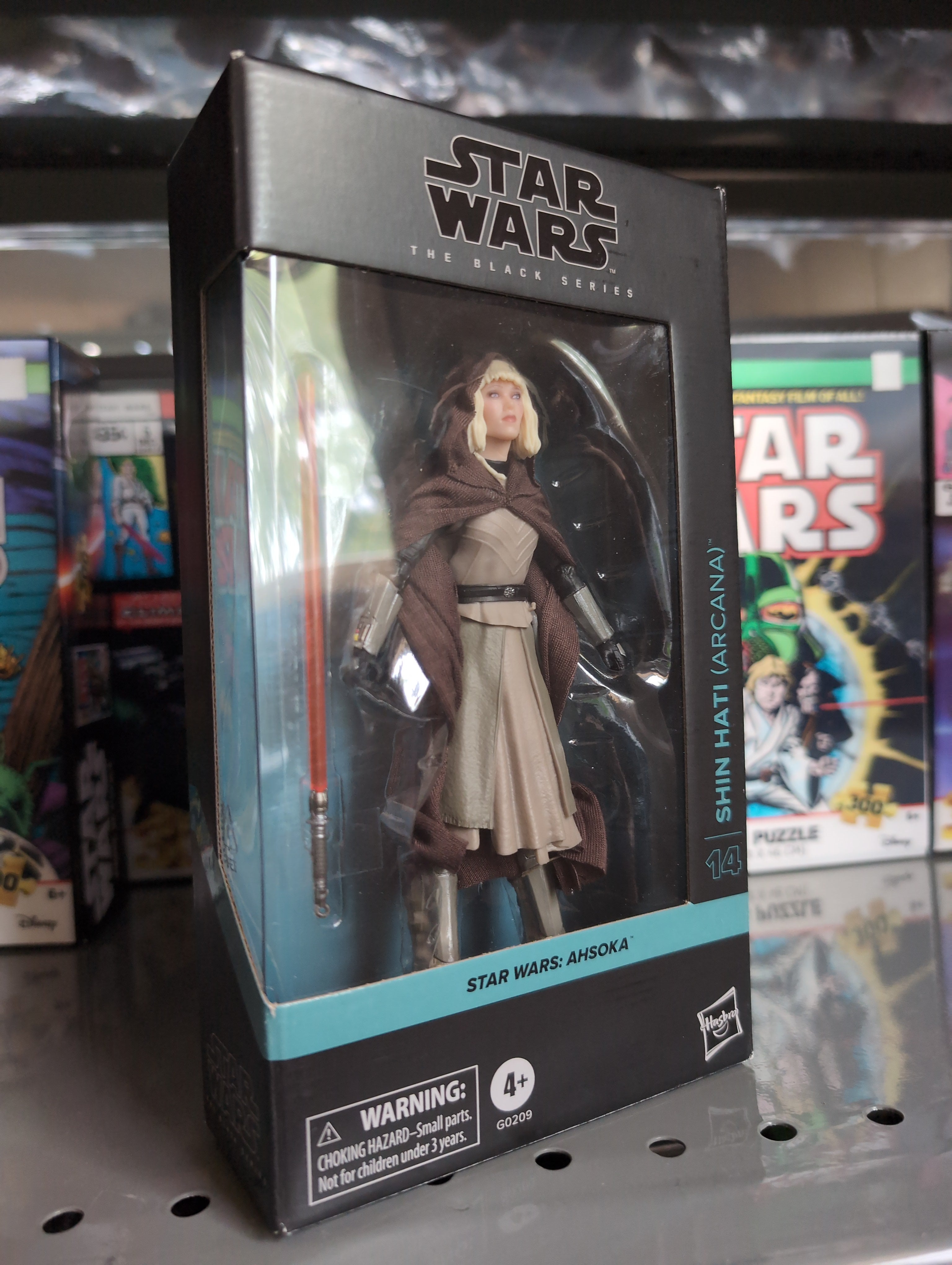 Hasbro Star Wars Black Series Shin Hati Arcana action figure in detailed packaging with lightsaber accessory visible