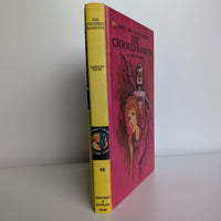 Vintage Nancy Drew Mystery Book 48 The Crooked Banister by Grosset & Dunlap with yellow spine and pink cover