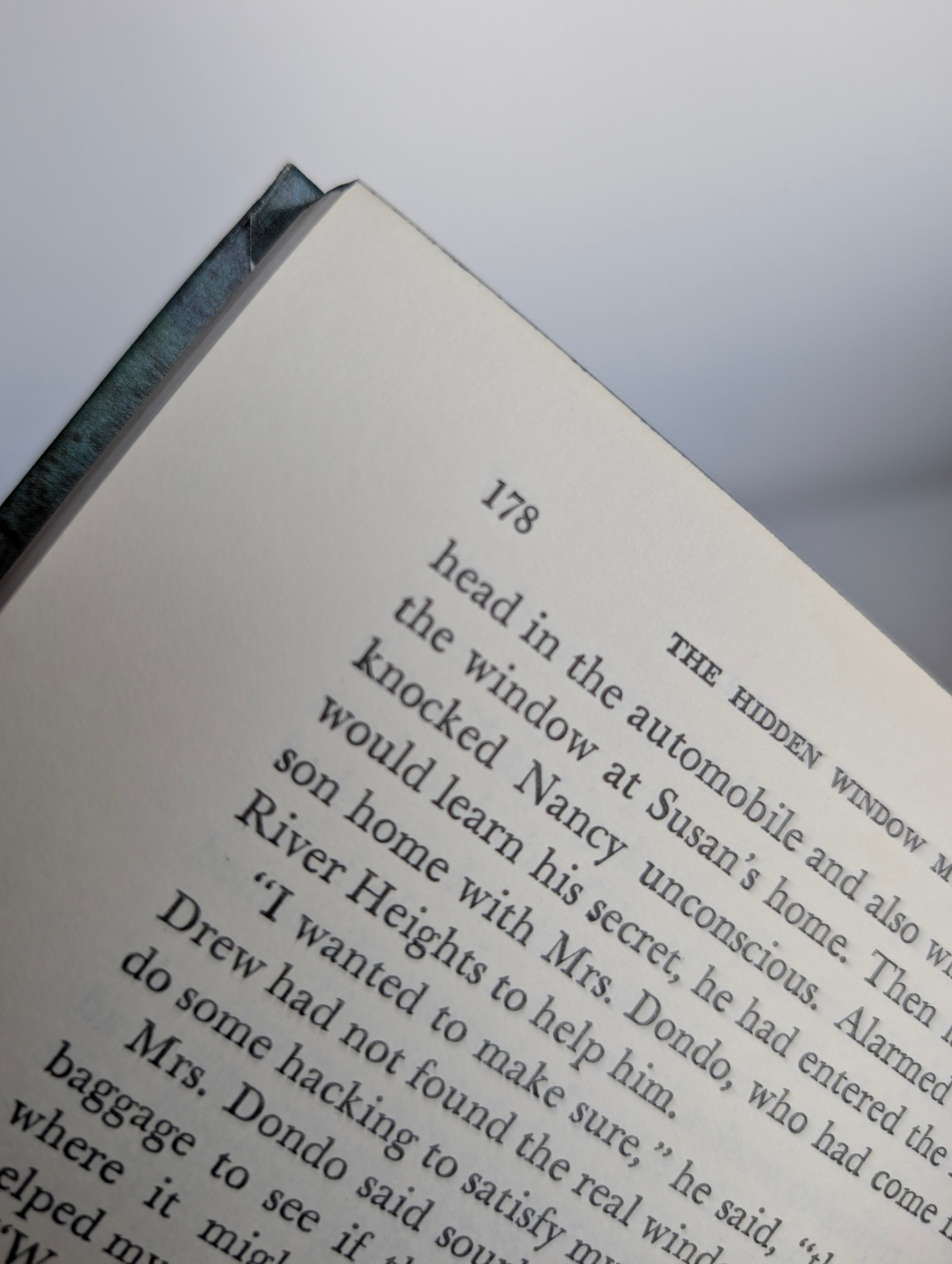 34 The Hidden Window Mystery Nancy Drew Book -1956/1975 (white-endpages) open to page 178 showing part of text by Grosset & Dunlap, Inc.
