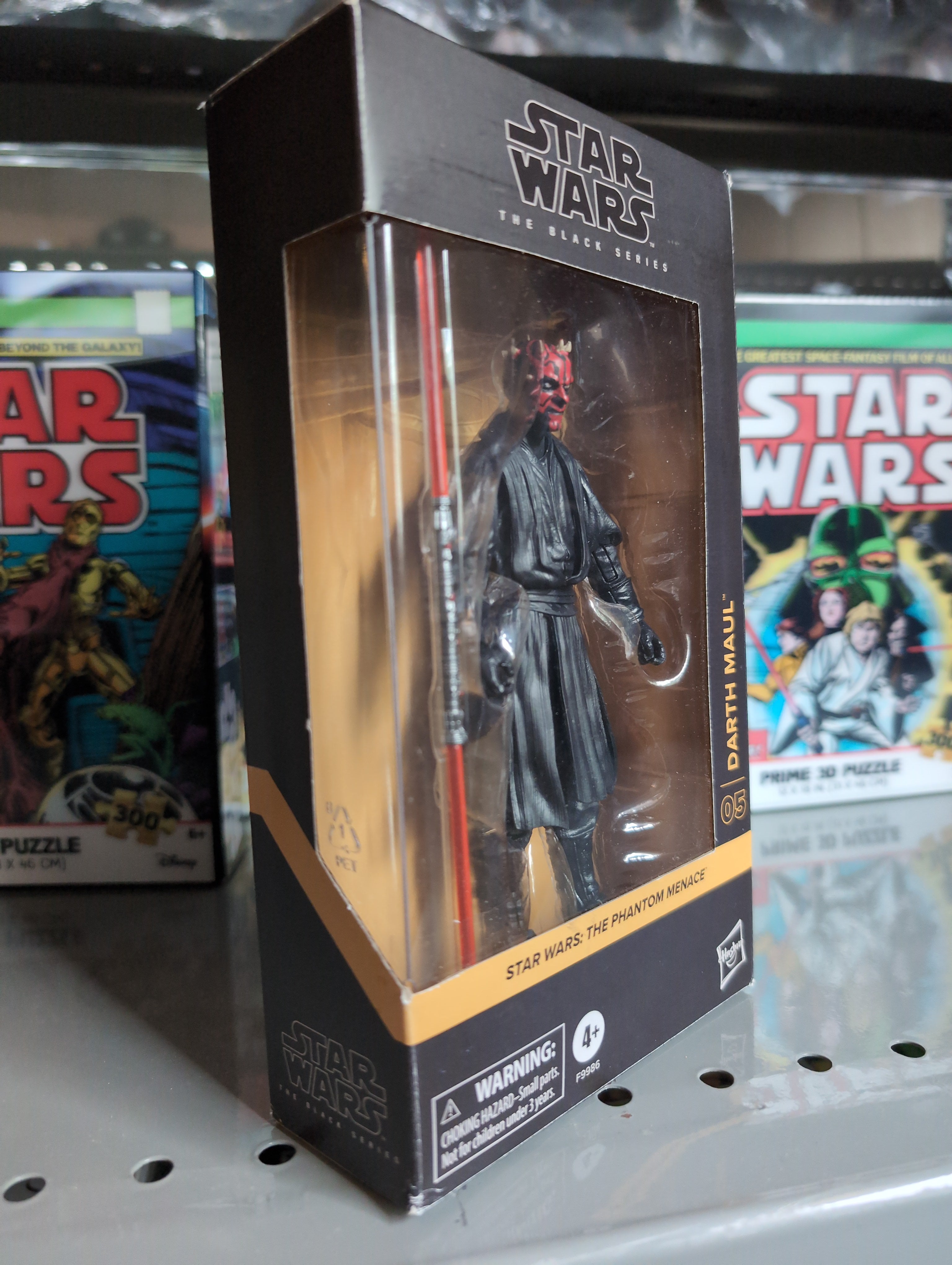 Hasbro Star Wars Black Series 6-inch Darth Maul action figure in Phantom Menace packaging on display shelf