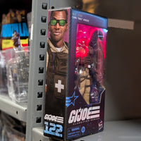 Hasbro GI Joe Classified Series Carl Doc Greer 6-inch action figure in packaging displayed on metal shelf