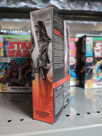 Hasbro Star Wars Black Series Vernestra Rwoh Jedi Master action figure packaging on a store shelf display.