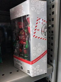 Hasbro Star Wars Black Series Christmas Biker Scout Trooper figure in festive armor with Santa hat in collector box
