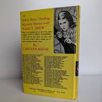 Vintage Nancy Drew The Crooked Banister mystery book back cover by Grosset & Dunlap 1971 edition