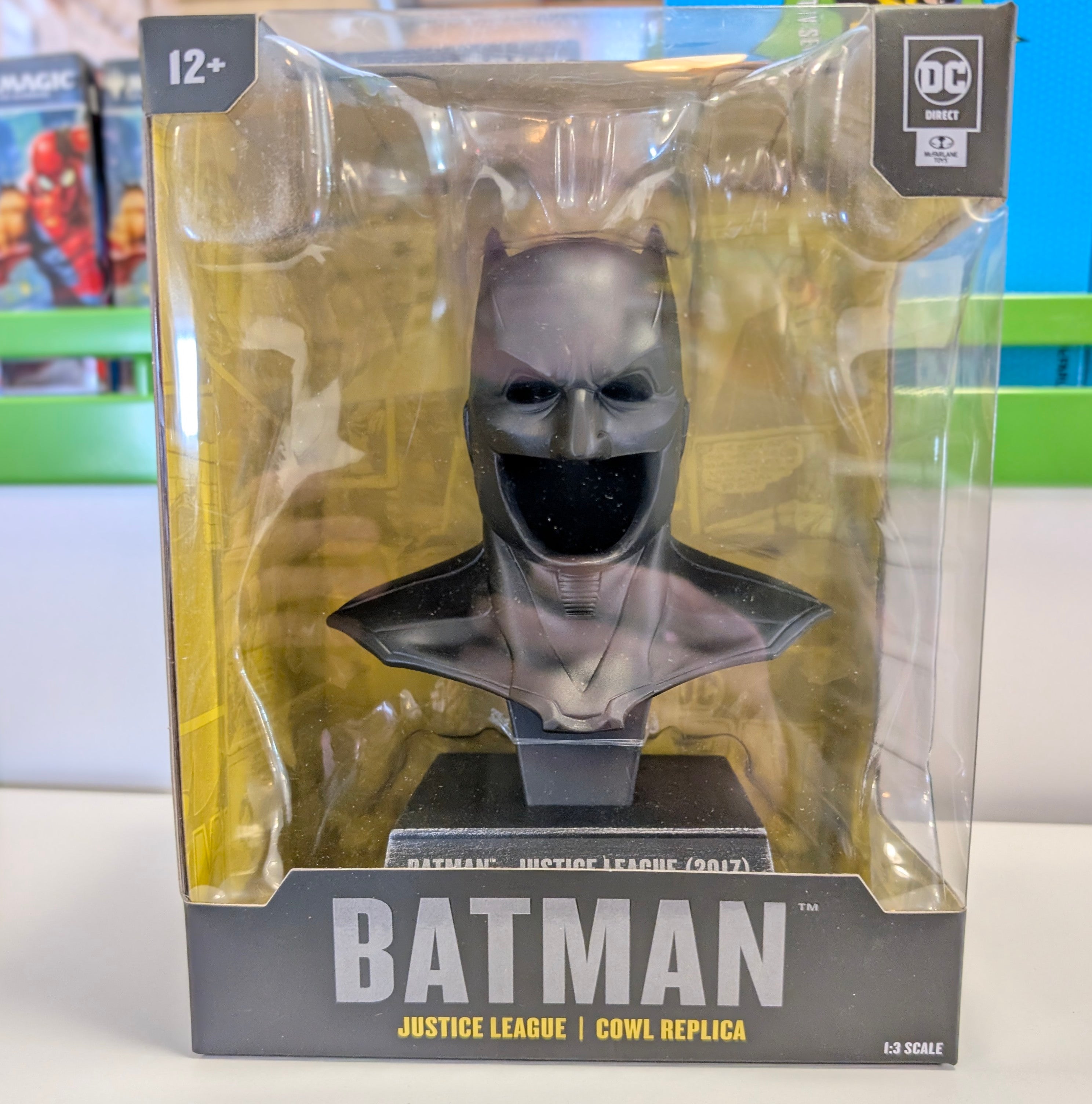 Hasbro DC Direct 1:3 scale Batman Justice League cowl replica prop in clear display packaging, detailed mask bust