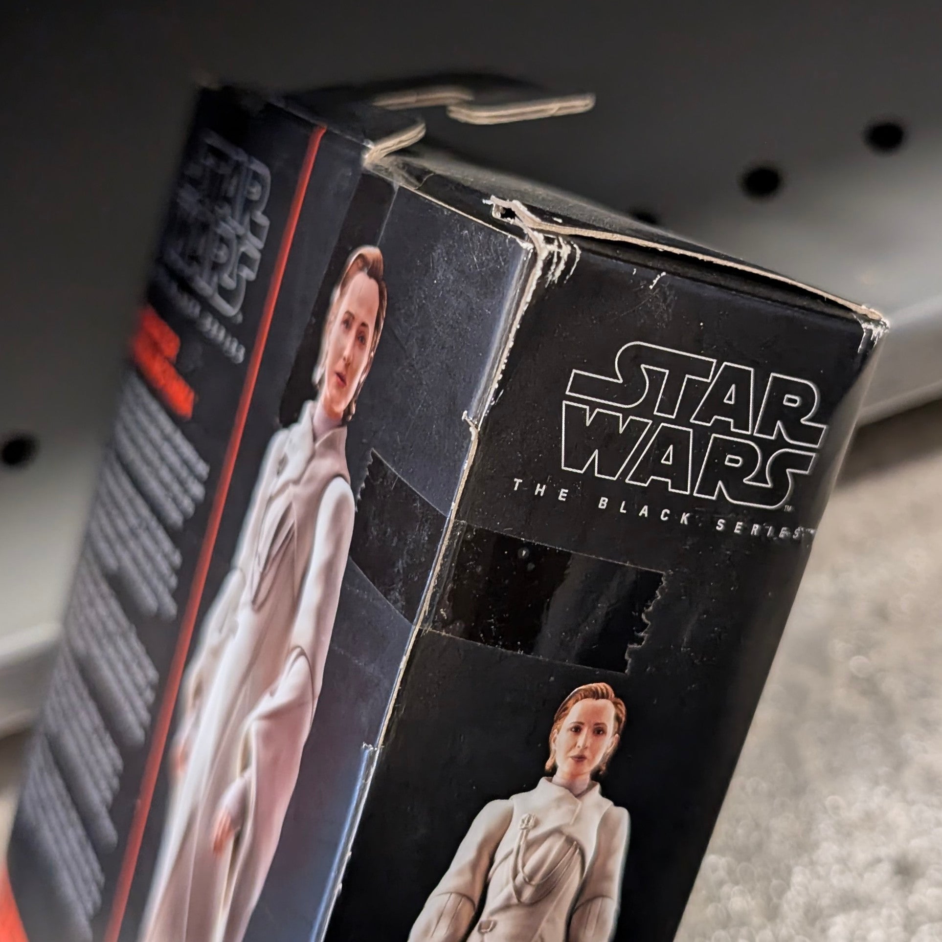 Hasbro Star Wars Black Series Senator Mon Mothma action figure box with noticeable corner damage and wear