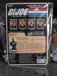 Hasbro Snake Eyes G.I. Joe action figure in black tactical gear with sword and blaster in vintage packaging