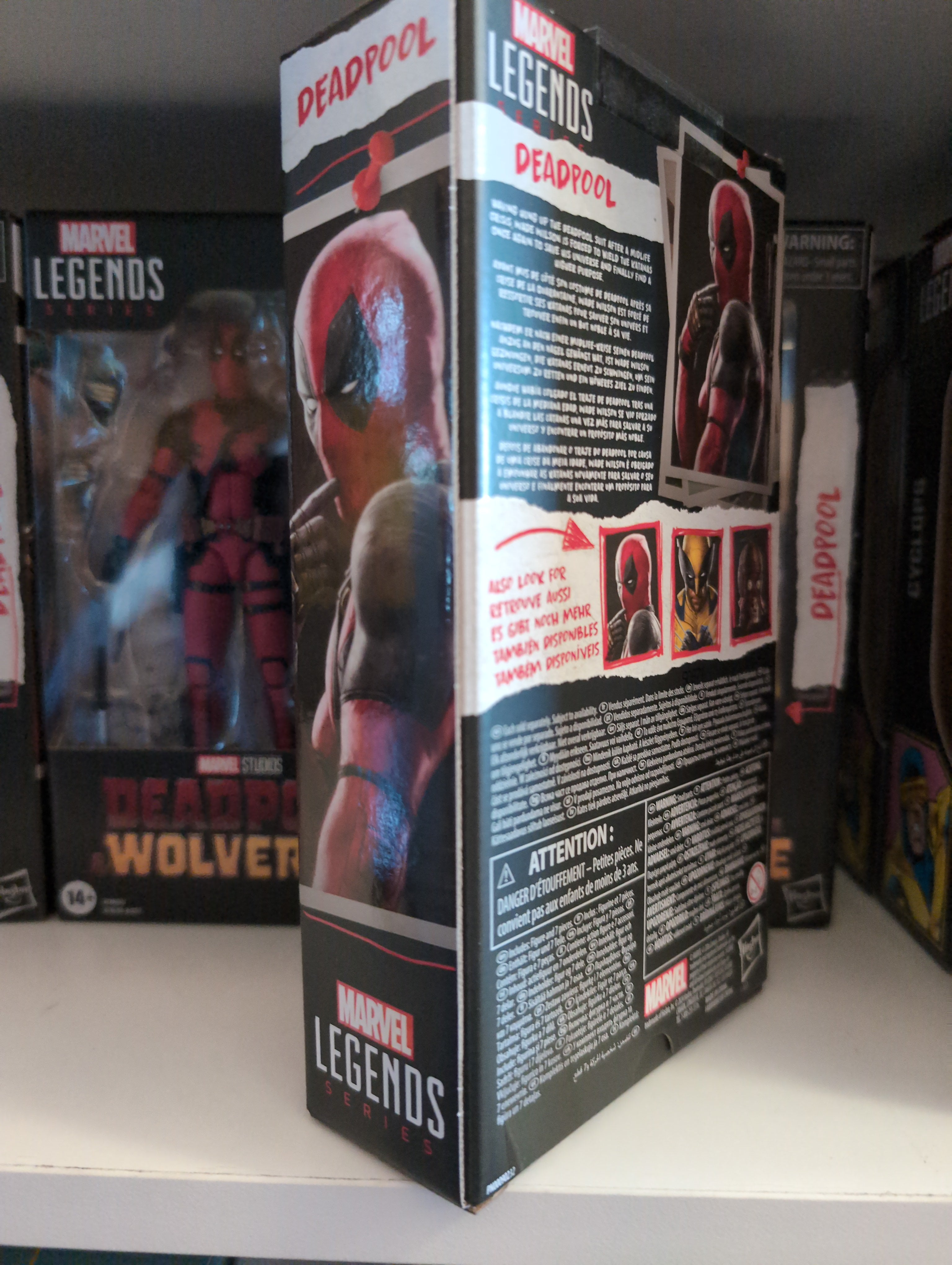 Hasbro Marvel Legends Deadpool action figure packaging with detailed character images on a store shelf