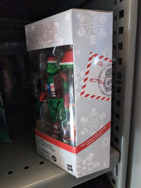 Hasbro Star Wars Christmas First Order Trooper action figure in holiday-themed packaging on a shelf