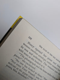 Vintage Nancy Drew Mystery The Clue in the Old Album 1947 yellow bar edition by Grosset & Dunlap pages viewed
