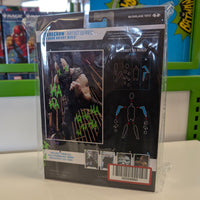 McFarlane DC Multiverse Scarecrow Jokerized Artist Series 7-inch action figure packaged back view with build parts diagram