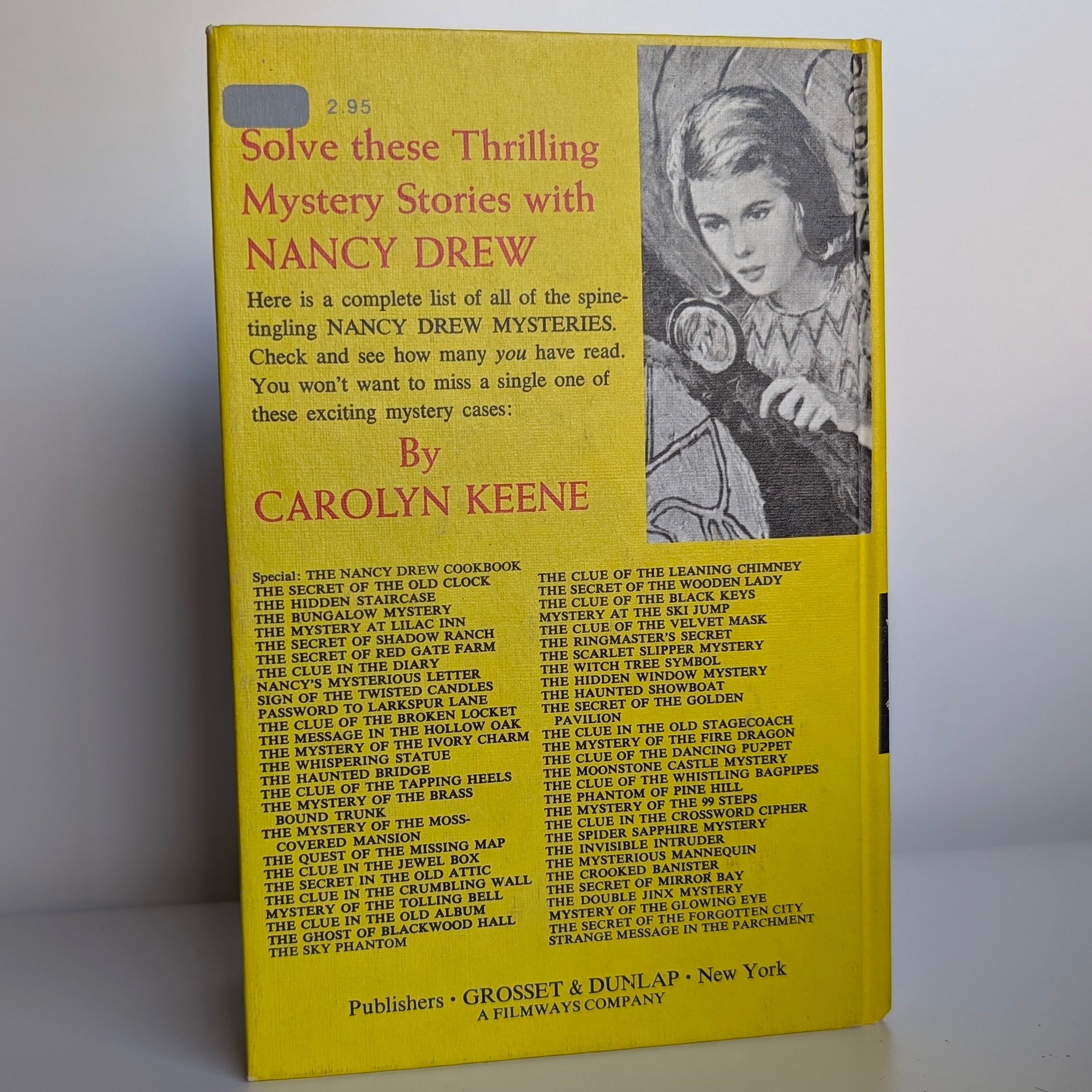34 The Hidden Window Mystery Nancy Drew Book -1956/1975 (white-endpages) by Grosset & Dunlap, Inc., back cover view