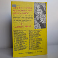 34 The Hidden Window Mystery Nancy Drew Book -1956/1975 (white-endpages) by Grosset & Dunlap, Inc., back cover view