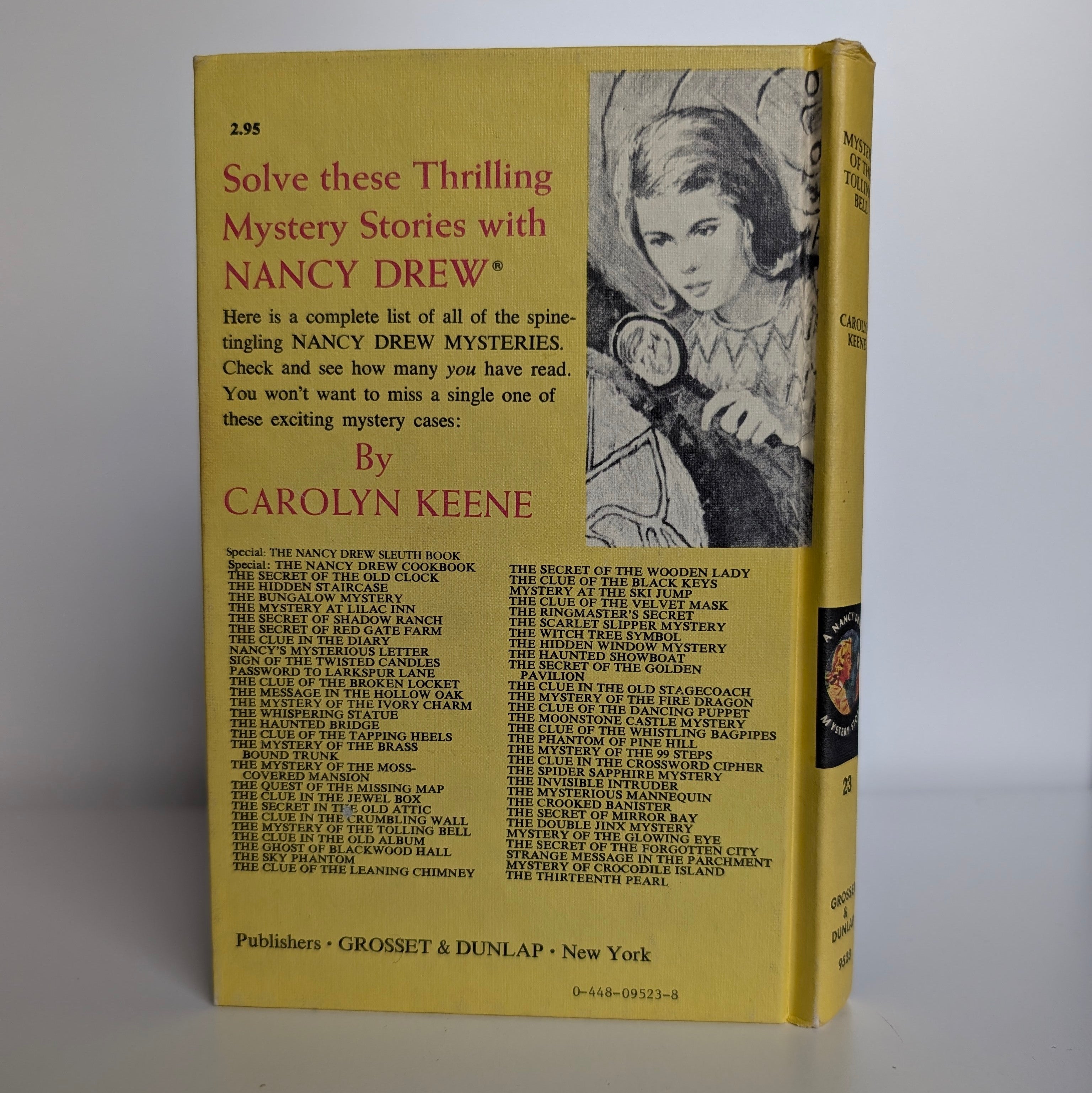 Nancy Drew Mystery 1946 1973 edition back cover with list of stories by Grosset & Dunlap Inc