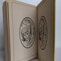 Open Nancy Drew book showing black and white cameo endpages illustration published by Grosset & Dunlap